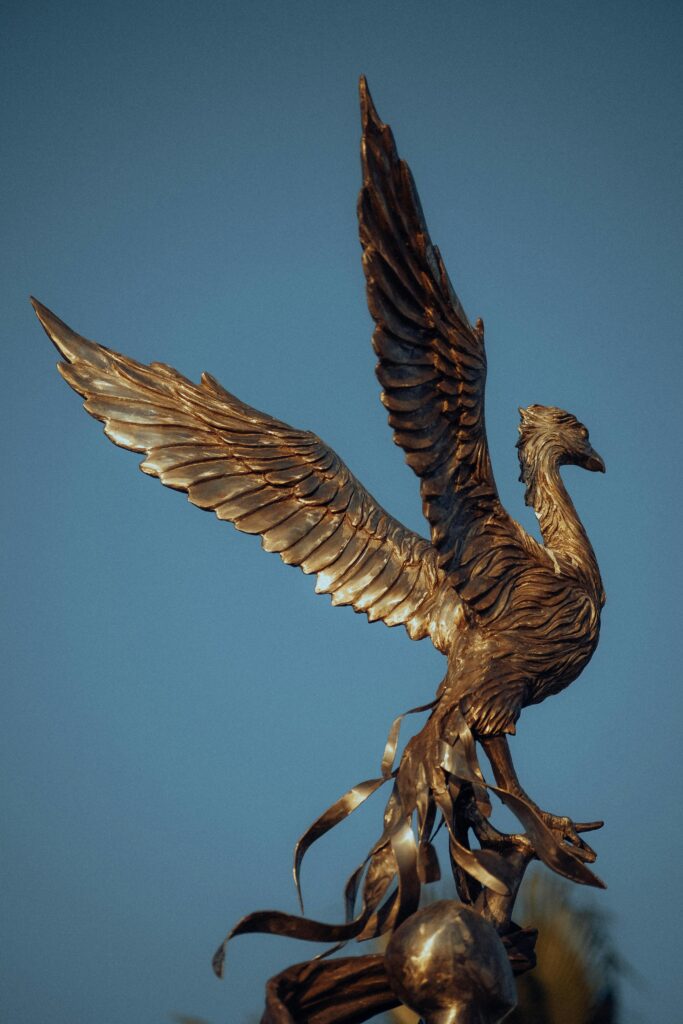 Elegant bronze bird sculpture with outstretched wings in Fethiye, Türkiye.